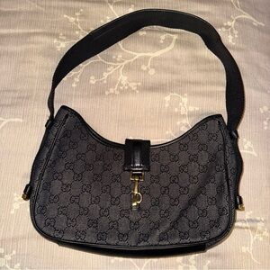 Gucci Black Shoulder Bag with Iconic Monogram and Leather Trim
